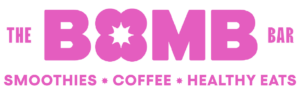 Logo for The Bomb Bar featuring bold pink text promoting smoothies, coffee, and healthy eats.