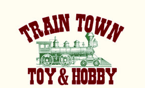 Logo features a vintage steam train with "TRAIN TOWN TOY & HOBBY" text above and below.