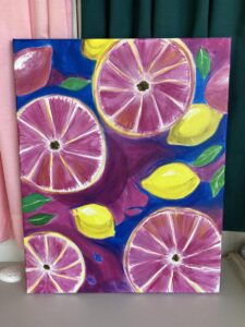 Colorful painting of sliced lemons and pink citrus fruits on a vibrant background.