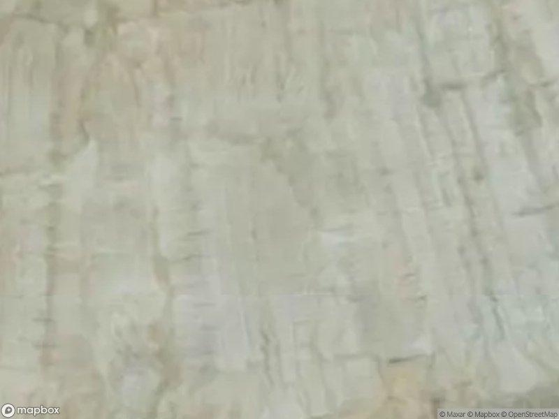 Satellite image shows a textured, light-colored surface with subtle variations.