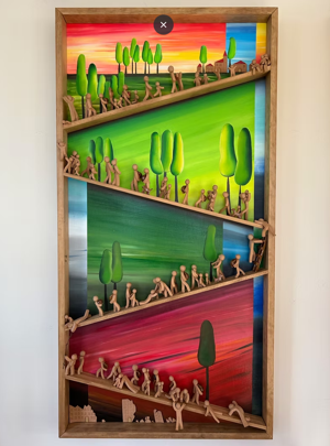 A wooden art piece with colorful backgrounds and small figures interacting in various scenes.