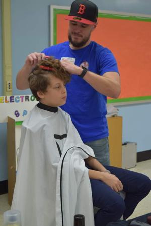 New Berkeley barbershop offers free haircuts to honor roll students