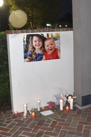 In rain and candlelight, Summerville remembers Emory and Harlow Deacon